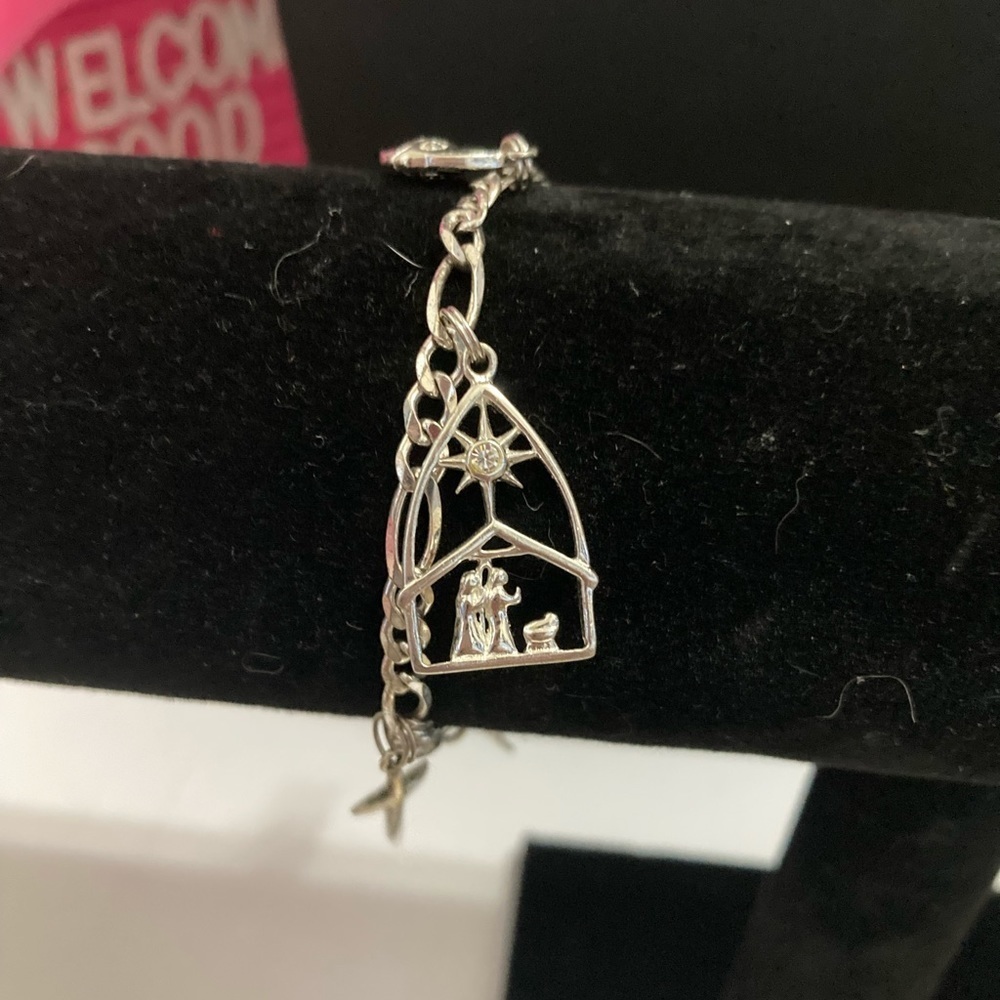Sterling Silver 925 charm bracelet.​​ size 6.5